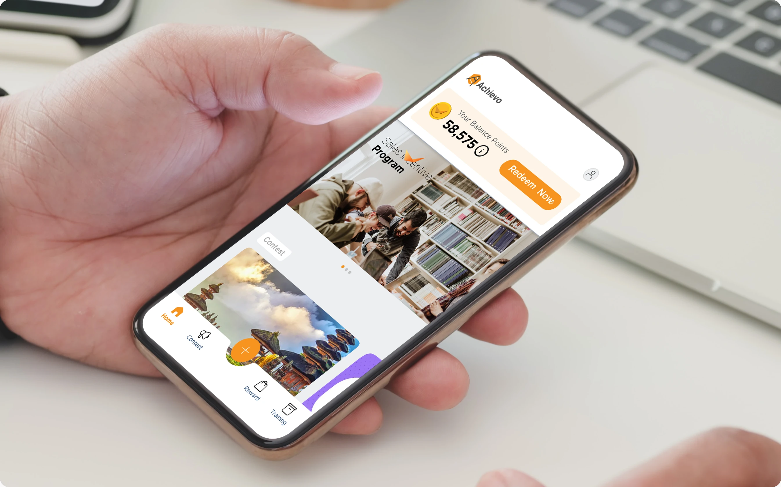 A hand holding a phone running the Channel Smart app
